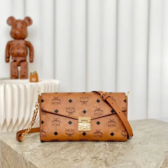 MCM Tan Monogram Clutch with Gold Accent - Picture 5 of 9